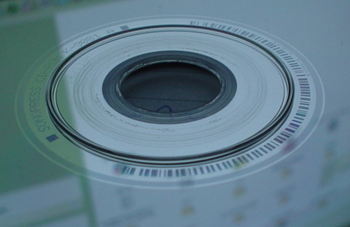 CD with Windows Reflected in it.